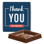 Chocolate square in jarsine paper